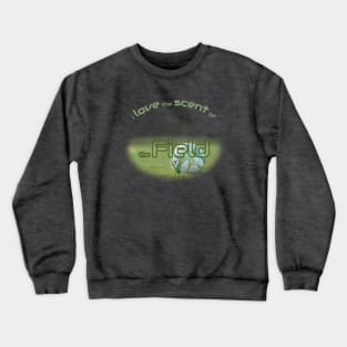 Green soccer ball in the field Crewneck Sweatshirt